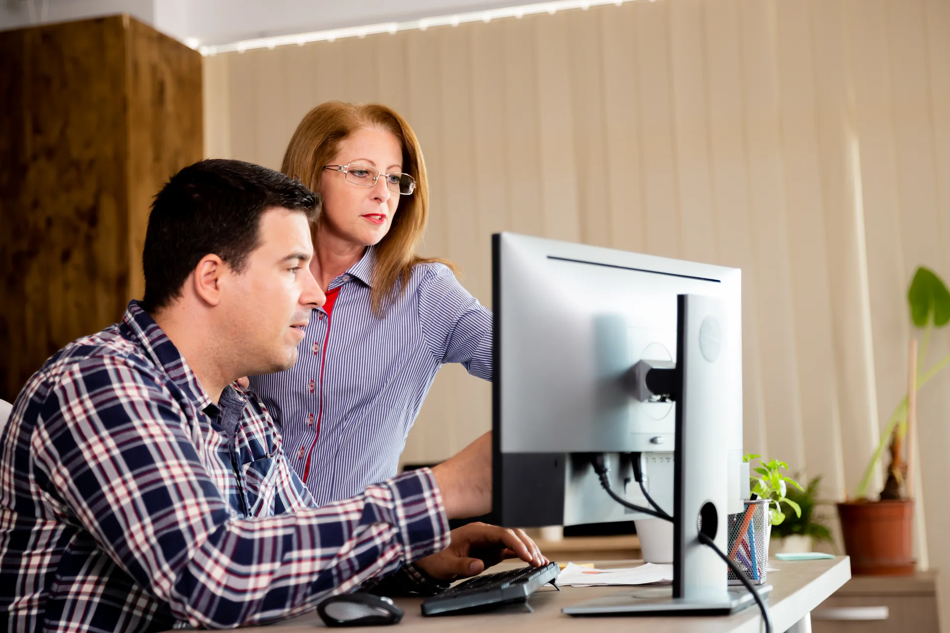 Computer users discussing their IT support needs